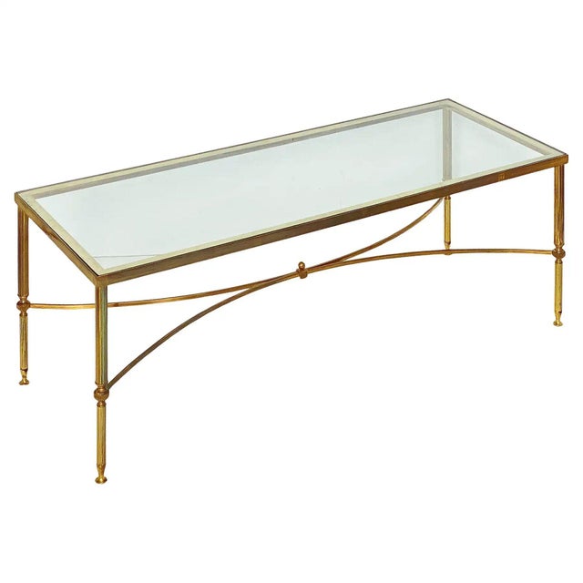 A fine French Modern rectangular low or coffee or cocktail table from the Hollywood Regency period in the style of the...