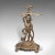 This is a vintage decorative stick stand. An Italian, pressed brass hall rack with figure, dating to the mid 20th century,...