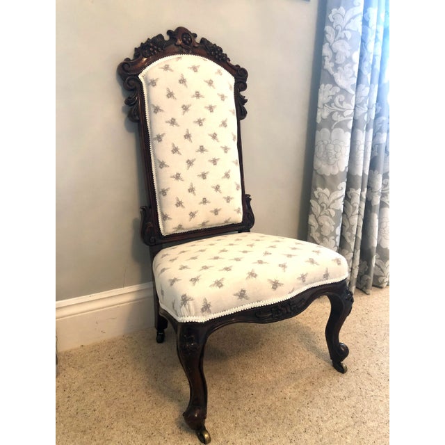 Fine Victorian carved rosewood ladies chair having a finely carved shaped top with carved sides and legs. This attractive...