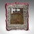 This is a vintage decorative mirror. An English, sterling silver and glass mirror, dating to the mid-20th century, circa...
