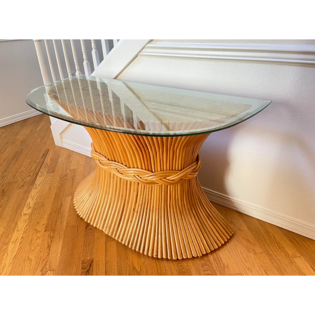 the bamboo frame of this table is shaped like a sheaf of wheat, very typical of McGuire’s work and one of his most popular...