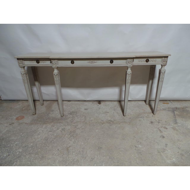This is a unique Swedish Gustavian Style Conso0le Table. it was restored and repainted with Milk Paints "Oyster White"