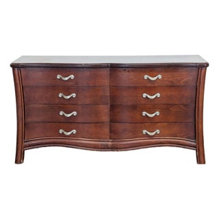 Vintage 8-Drawer Curved Front Wooden Dresser With Elegant Handles For Sale