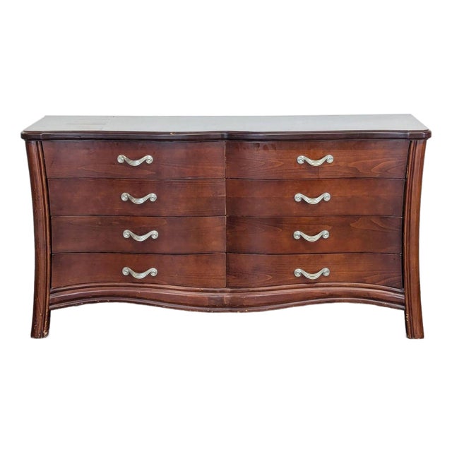 Vintage 8-Drawer Curved Front Wooden Dresser With Elegant Handles For Sale