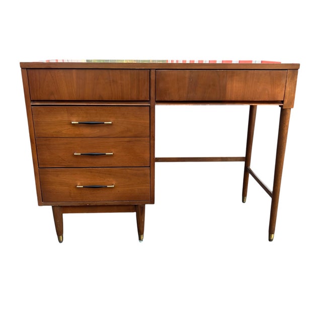 Mid-Century Modern Walnut Writing Desk or Vanity With Brass-Capped Legs A sleek and functional Mid-Century Modern desk...