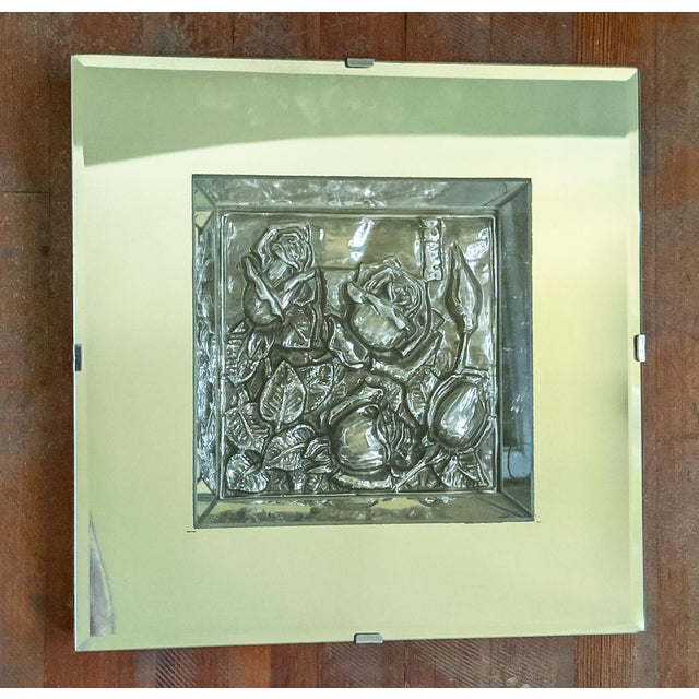 We are selling this mid-century repousse floral plaque in great mirror shadowbox frame. The frame is the great thing about...