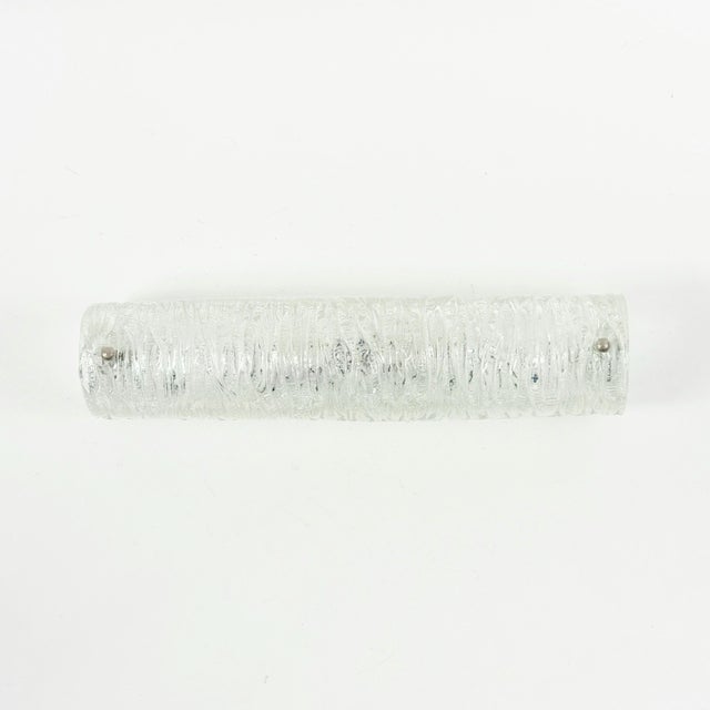 Stunning tubular wall light/sconce from hillebrand (germany, 1970s). Transparent handcrafted murano ice glass shade and...