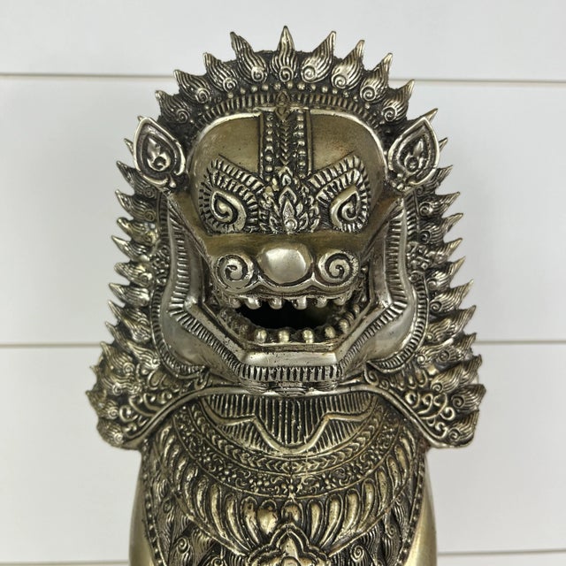 Incredible vintage Khmer temple Singha lion or foo dog statute in a silver/metallic finish. Has a beautiful patina and...
