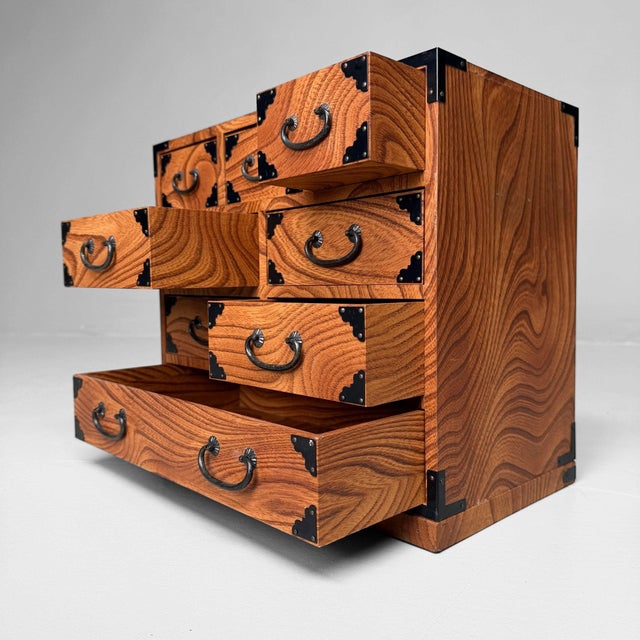 A compact vintage chest with the distinctive look of a traditional Japanese tansu. Dimensions: height 32 cm, width 36 cm,...