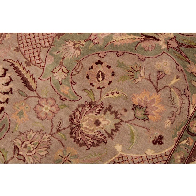 Designed with mesmerizing intricacy and gorgeous color palette, this hand-knotted masterpiece demonstrates the beauty and...