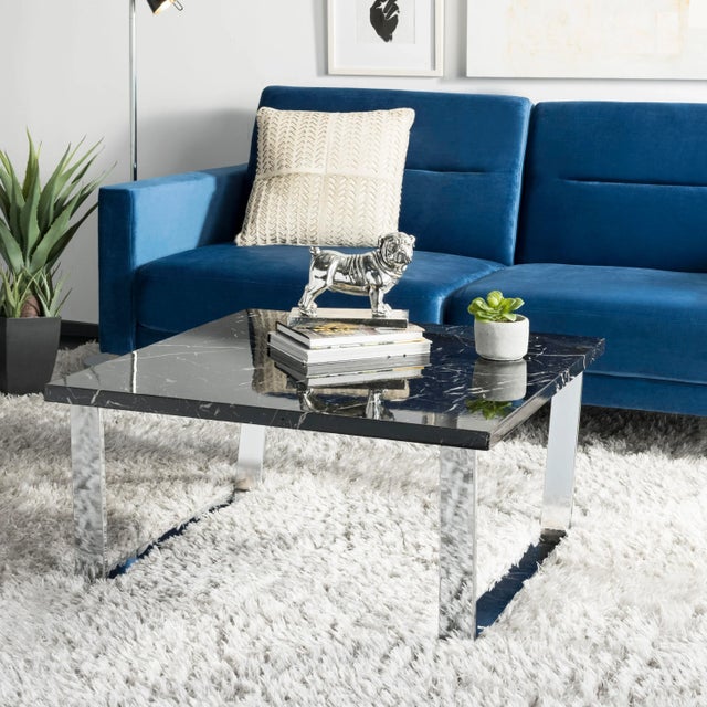 Instantly update any living room with this contemporary square coffee table. it's decadent design creates a luxurious...