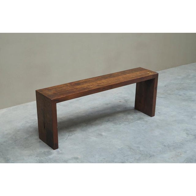 A wonderful architectural bench in solid oak. Europe, mid 20th century. Highly simple in design, but very strong visually...