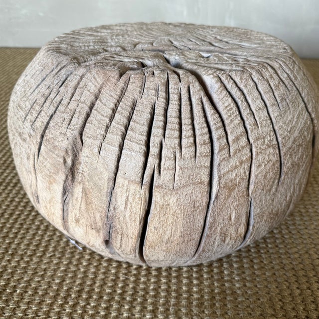 16"D x 10"H Crafted from solid elm wood, this sculptural stump showcases the natural beauty and character of organic...