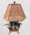 A sweet adorable tole cache potted plant table lamp with vintage wicker shade. The lamp features a very heavy weighted...