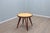 An elegant and original mid-century italian design round side table by augusto romano, 1940s. A well-executed table that...
