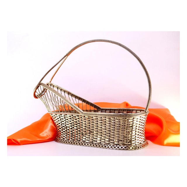 Silver Bottle Holder with Corded Handle and Openwork Trim, in Good conditions. Designed 1980 to 1989