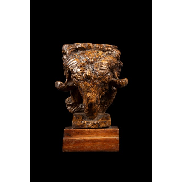 This stunning burl wood sculpture of a ram's head, crafted by renowned Swiss sculptor Edwin Bucher, showcases the artist's...