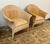Design Plus Gallery presents a Pair of Woven Rattan Tub Chairs from the Mid 20th Century. The vintage set have a...