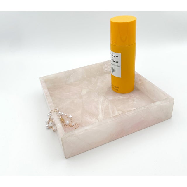 The Rose Quartz Tray is carefully hand-carved from soothing rose quartz, known for its loving energy and soft pink hues,...