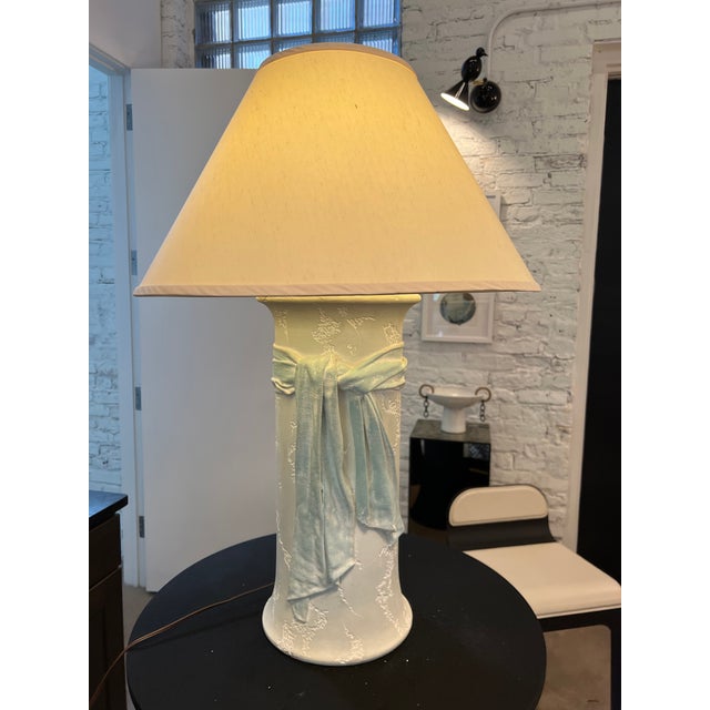 Excellent condition - but some minor signs of use and wear. Small chip at corner of ribbon- can be seen in the image....