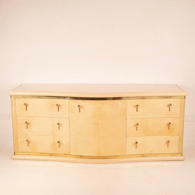 Extraordinary and extremely rare curved cabinet designed by Luciano Frigerio and produced for the renowned Frigerio di...