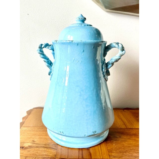 Striking, vintage, ceramic, blue distressed urn with lid. This Italian beauty will make any room shine, it’s illustrious...