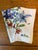 Pair of Classic Vera Neumann Cotton Napkins with Floral Design ~ I recognize the lilies, but not sure about the red...