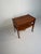 Original Danish teak side table from the 1960s, featuring a practical drawer and a distinctive woven storage basket...