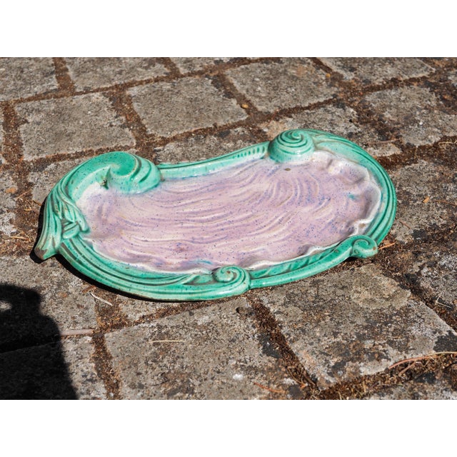 Large dish or tray, Art Nouveau scrollwork turquoise border, purple oyster-shaped background. Could be used as an inkwell....