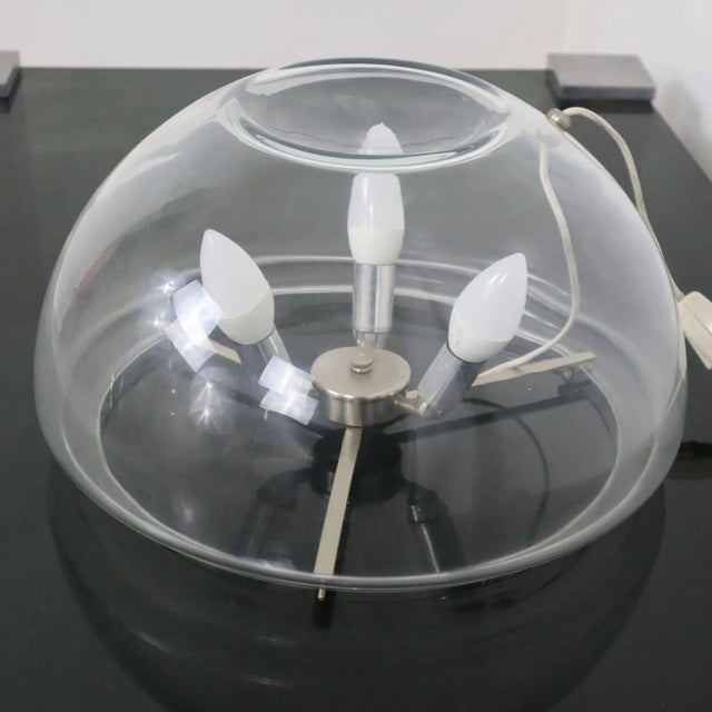 This transparent chrome-toned lamp lends itself to a wide range of contexts, from the dining room to the living room,...