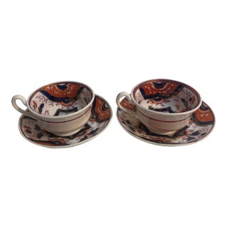 2 Antique Gaudy Welsh Tea Cups and Saucers - Burnt Orange Blue White Porcelain - Matching Pair For Sale