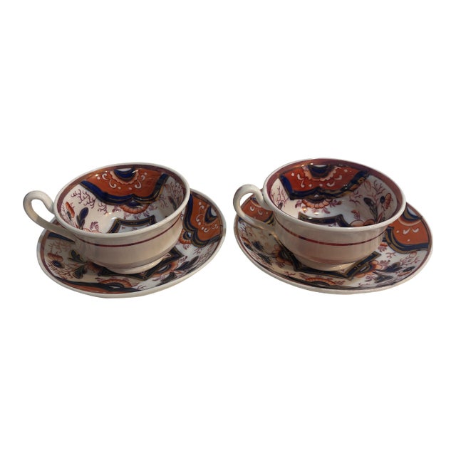 2 Antique Gaudy Welsh Tea Cups and Saucers - Burnt Orange Blue White Porcelain - Matching Pair For Sale