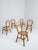 This elegant set of five Italian Mid-Century Modern dining chairs, crafted in Italy during the mid-20th century,...