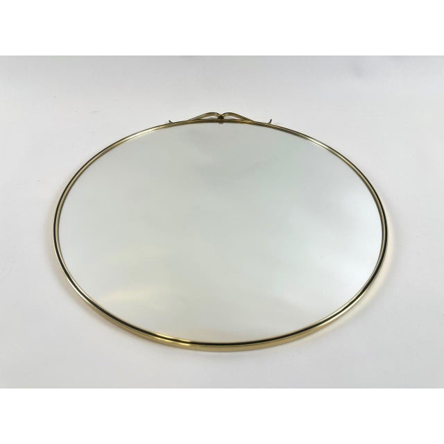 Mid-Century Modern German Round Wall Mirror in Aluminium, 1970s, in Very Good conditions. Designed 1970 to 1979