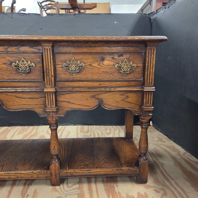 This Oak Potboard Dresser Base With Turned Legs and Shaped Frieze on turned legs would make a great sideboard in a dining...