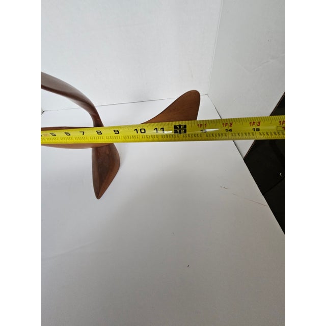 This beautiful Emil Milan wood sculpture is signed and the wood is walnut. The lyrical carving looks so life like you...