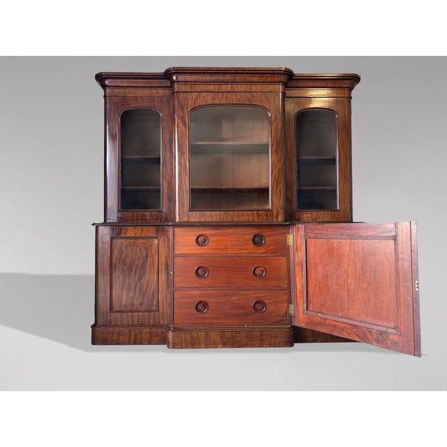 Quality 19th-Century Victorian Figured Mahogany Breakfront 3-Door Library Bookcase A fine quality 19th century Victorian...