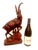 Available is an antique early / mid-20th century wooden carved sculpture of an ibex. Made of linden wood and stained to a...