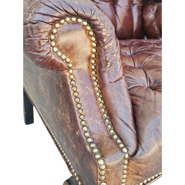 This stunning high-back wing chair is the epitome of classic sophistication. Upholstered in luxurious Bistro Chocolate...