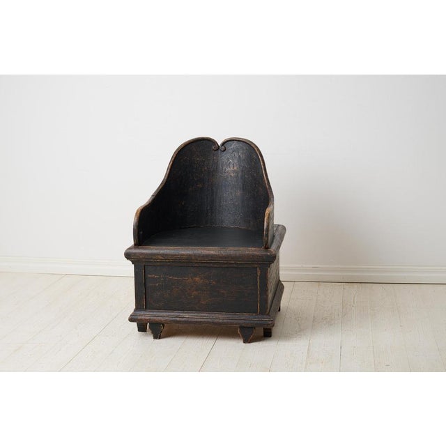 19th century unusual chair in folk art from northern Sweden. This is antique chair is made by hand in solid pine around...
