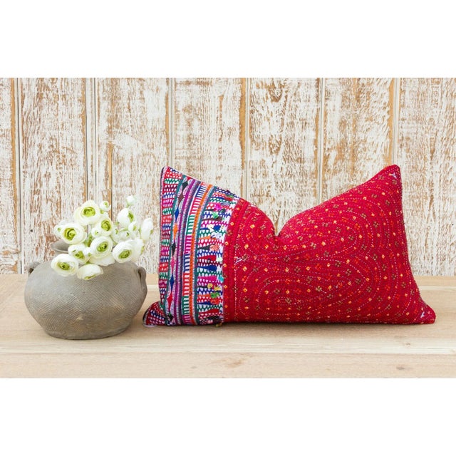 These colorful throw pillows are made from Rabari tribal dowry bags. The embroidery is on cotton and has intricate chain...