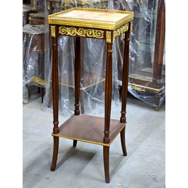 Elevate your interior with the timeless elegance of this French Louis XVI-inspired side table, beautifully handcrafted to...