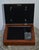 Vintage (1990's) Picture - Music/Jewelry Box. Made of Wood. Mahogany. The Box has a Velvet Lining. Top Fabric Can Be...