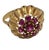 Vintage 14K Yellow Gold and Ruby Cluster Cocktail Ring. Ring features a slightly larger central ruby encircled with eight...
