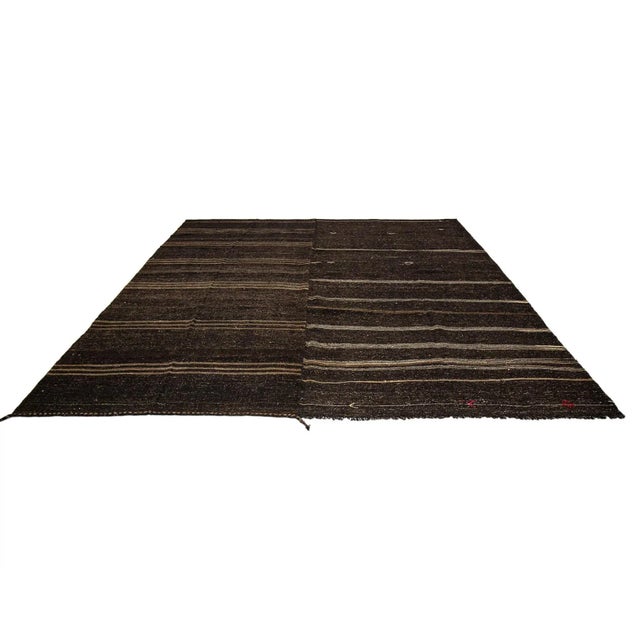 Large vintage handwoven kilim rug from Afyon region of Turkey. Approximately 50-60 years old. In very good condition