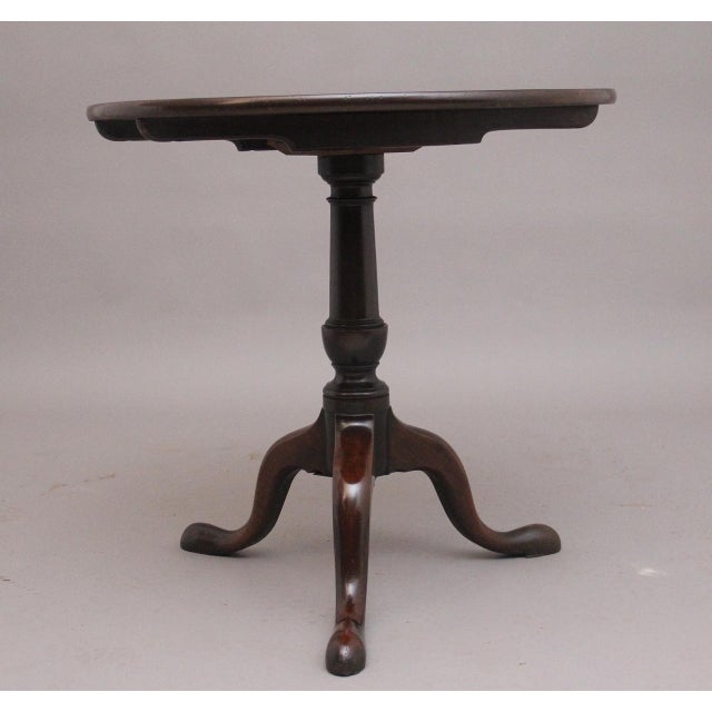 18th Century mahogany tripod table, having a lovely figured circular top, supported on wonderfully turned column...