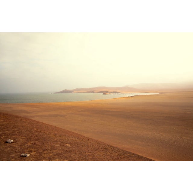 A landscape photograph of both the desert and sea in Paracus, Peru. It measures 20" x 30" and is in excellent condition...