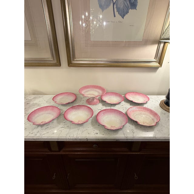 A rare and beautifully preserved antique English dessert service by Wedgwood, dated 1891. This elegant Victorian majolica...