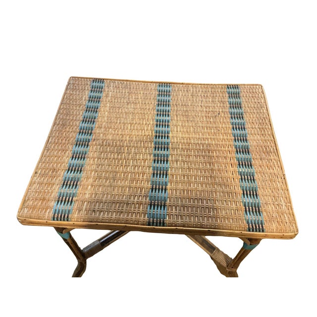 Cute 1920’s French wicker table with blue accents. Would be perfect for your patio, or even an end table