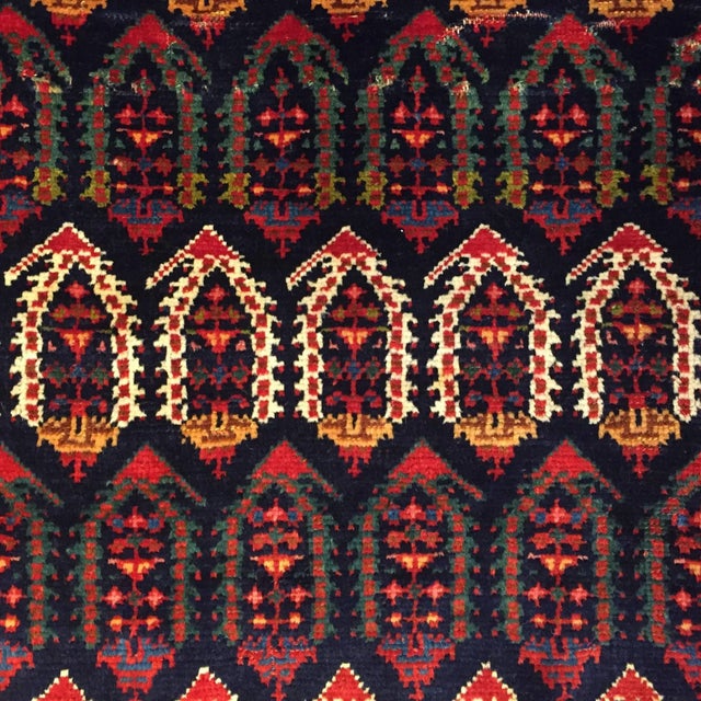 A late 19th century Azeri rug, woven with an all-over paisley pattern of alternating white and multicolored paisleys...
